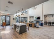 Thumbnail 15 of 37 - the preserve at ballantyne commons clubhouse with an open floor plan and a fireplace