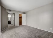 Thumbnail 23 of 36 - a bedroom with gray carpet and white walls