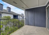 Thumbnail 26 of 36 - a large patio with a door that leads to the backyard