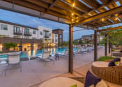 Thumbnail 34 of 36 - our apartments have a large pool and lounge area with chairs and tables