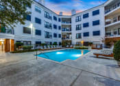 Thumbnail 27 of 37 - our apartments have a large swimming pool and a courtyard with lounge chairs