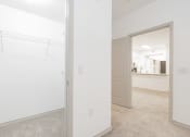 Thumbnail 40 of 41 - a large white room with white walls and a mirror