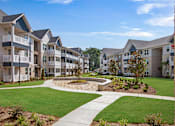 Thumbnail 42 of 47 - Apartment complex with a circular garden in the middle.