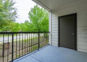 Thumbnail 26 of 41 - the balcony of a building with a door to a patio
