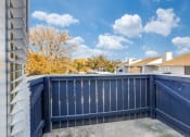 Thumbnail 12 of 20 - a blue fence with a house in the background