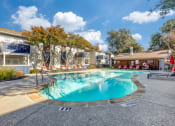 Thumbnail 17 of 20 - our apartments have a resort style pool with chairs