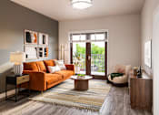 Thumbnail 1 of 25 - A living room with a couch, chair, and coffee table.