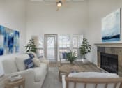 Thumbnail 5 of 23 - a living room with a white couch and a fireplace