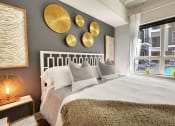 Thumbnail 4 of 17 - a bedroom with a bed and a window