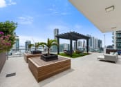 Thumbnail 6 of 66 - a large terrace with furniture and a pergola