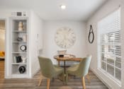 Thumbnail 17 of 37 - a dining room with a large clock on the wall