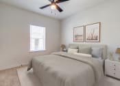Thumbnail 9 of 65 - an expansive bedroom with a large bed and a ceiling fan