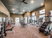 Thumbnail 10 of 17 - take advantage of the fitness center at the enclave at woodbridge apartments in sugar land, tx