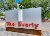 Thumbnail 39 of 40 - a sign for the everly on the side of a street