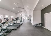 Thumbnail 28 of 40 - the gym has cardio equipment and treadmills on the floor