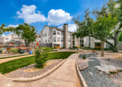 Thumbnail 37 of 40 - the preserve at ballantyne commons courtyard with landscaping and apartment buildings