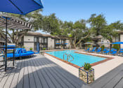 Thumbnail 13 of 33 - our apartments have a swimming pool and lounge chairs
