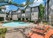Thumbnail 27 of 30 - our apartments have a large pool and lounge chairs