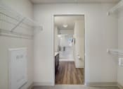 Thumbnail 4 of 23 - a bedroom with a closet and a door to a bathroom