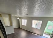 Thumbnail 22 of 36 - a view of a living room from the top of the stairs