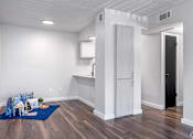 Thumbnail 21 of 66 - the living room and kitchen in a renovated apartment