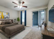 Thumbnail 11 of 24 - a bedroom with a large bed and a ceiling fan