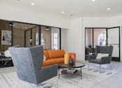 Thumbnail 16 of 66 - a living room with a orange couch and two chairs