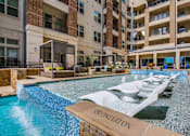 Thumbnail 19 of 22 - A swimming pool with the word "OPERATION" on the edge.