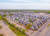 Thumbnail 56 of 66 - an aerial view of a suburb of a city with houses
