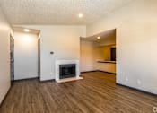 Thumbnail 44 of 66 - the living room of an apartment with a fireplace