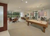 Thumbnail 18 of 23 - a large room with a pool table and a dining room