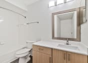 Thumbnail 9 of 35 - renovated bathroom with quartz countertops