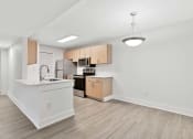 Thumbnail 4 of 35 - renovated apartment dining room and kitchen