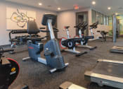 Thumbnail 11 of 16 - fitness center in our apartments on east riverside