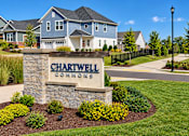 Thumbnail 1 of 33 - A sign for Chartwell Commons in front of a house.