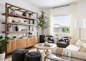 Thumbnail 5 of 21 - A living room with a white couch, a wooden shelf, and a glass coffee table.