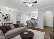 Thumbnail 5 of 32 - a living room with a couch and a coffee table