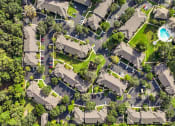 Thumbnail 3 of 67 - an aerial view of a neighborhood with houses and trees