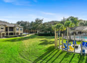 Thumbnail 64 of 67 - the backyard of a house with a yard and a pool