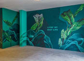 Thumbnail 13 of 41 - a large mural in a room with a wooden floor