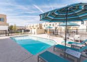 Thumbnail 12 of 46 - our apartments have a resort style pool with umbrellas