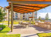 Thumbnail 15 of 33 - verdant courtyard in midland texas apartment