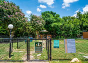 Thumbnail 28 of 32 - fully fenced pet park in luxury austin apartment
