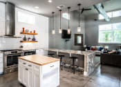Thumbnail 12 of 32 - clubhouse catering kitchen in luxury austin apartment