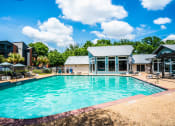 Thumbnail 24 of 32 - sparkling swimming pool in luxury austin apartment