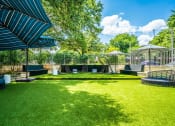 Thumbnail 25 of 32 - outdoor courtyard in luxury austin apartment