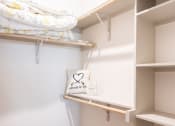Thumbnail 6 of 33 - walk in closet in modern midland texas apartment