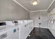 Thumbnail 19 of 23 - laundry facilities at the paddock club murfreesboro luxury apartment homes in nashville