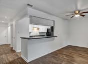 Thumbnail 6 of 23 - the living room and kitchen of a 560 square foot, 1 bedroom apartment at the casey