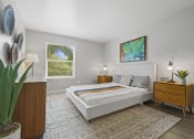 Thumbnail 11 of 44 - a bedroom with a bed and a dresser